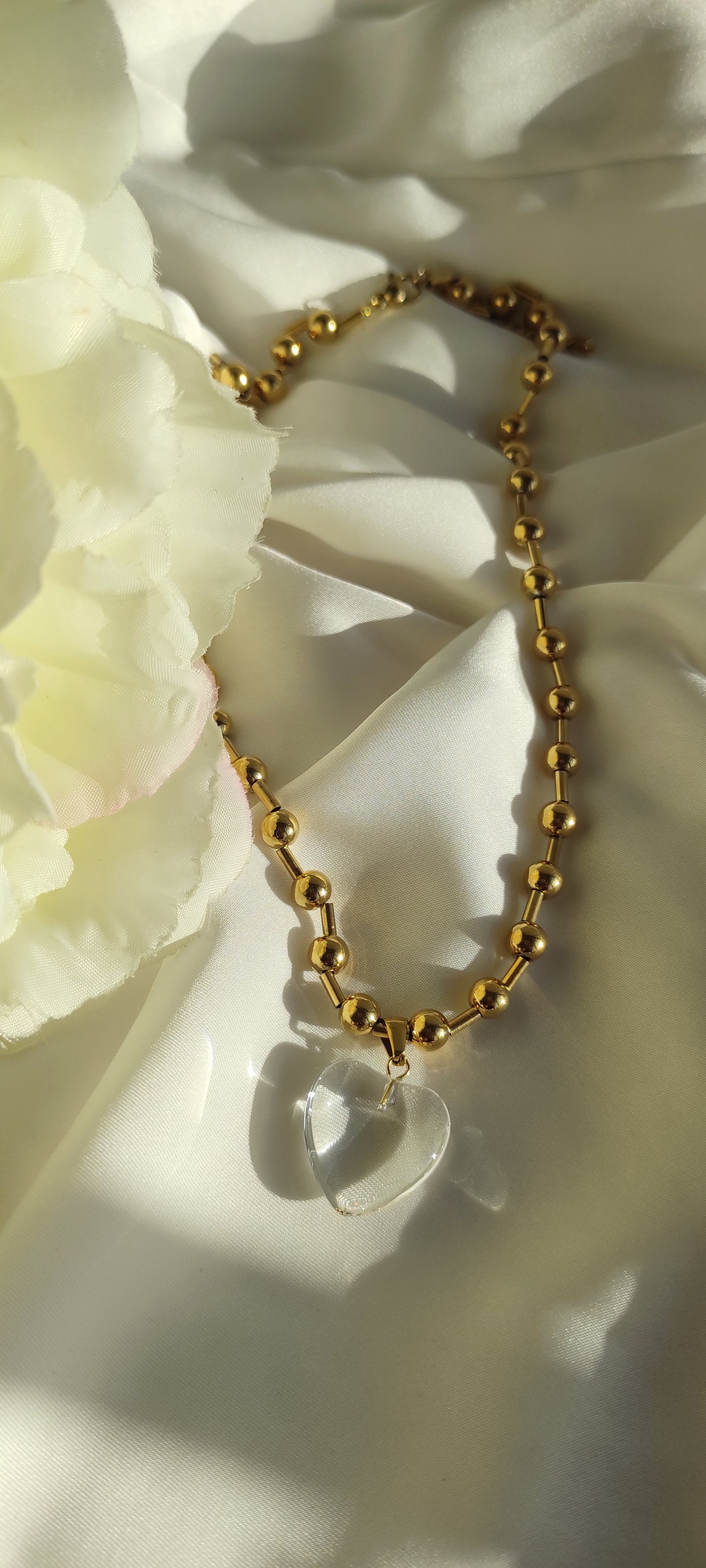 Dulce collar CENTELLA con colgante de corazón transparente