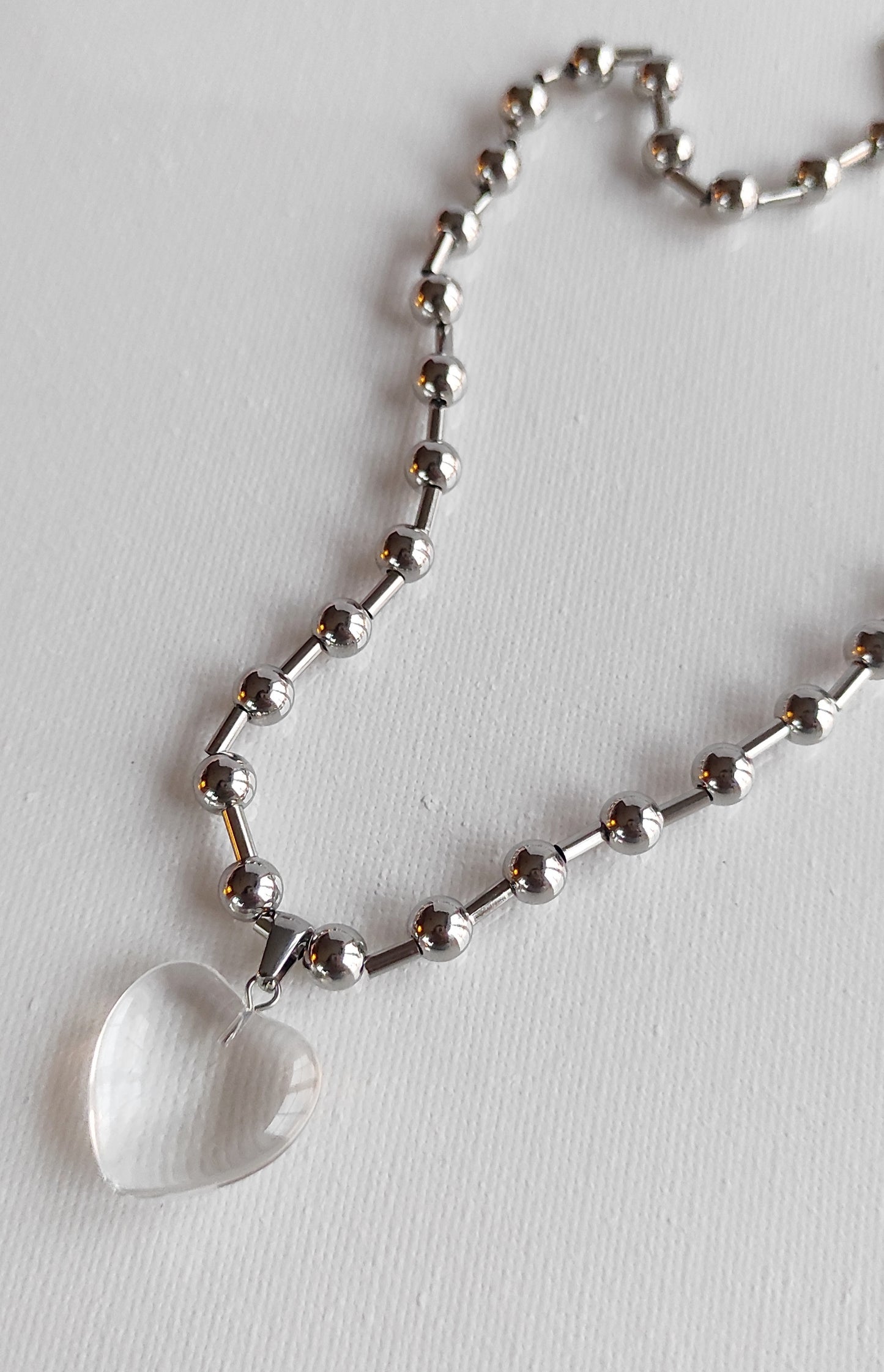 Dulce collar CENTELLA con colgante de corazón transparente