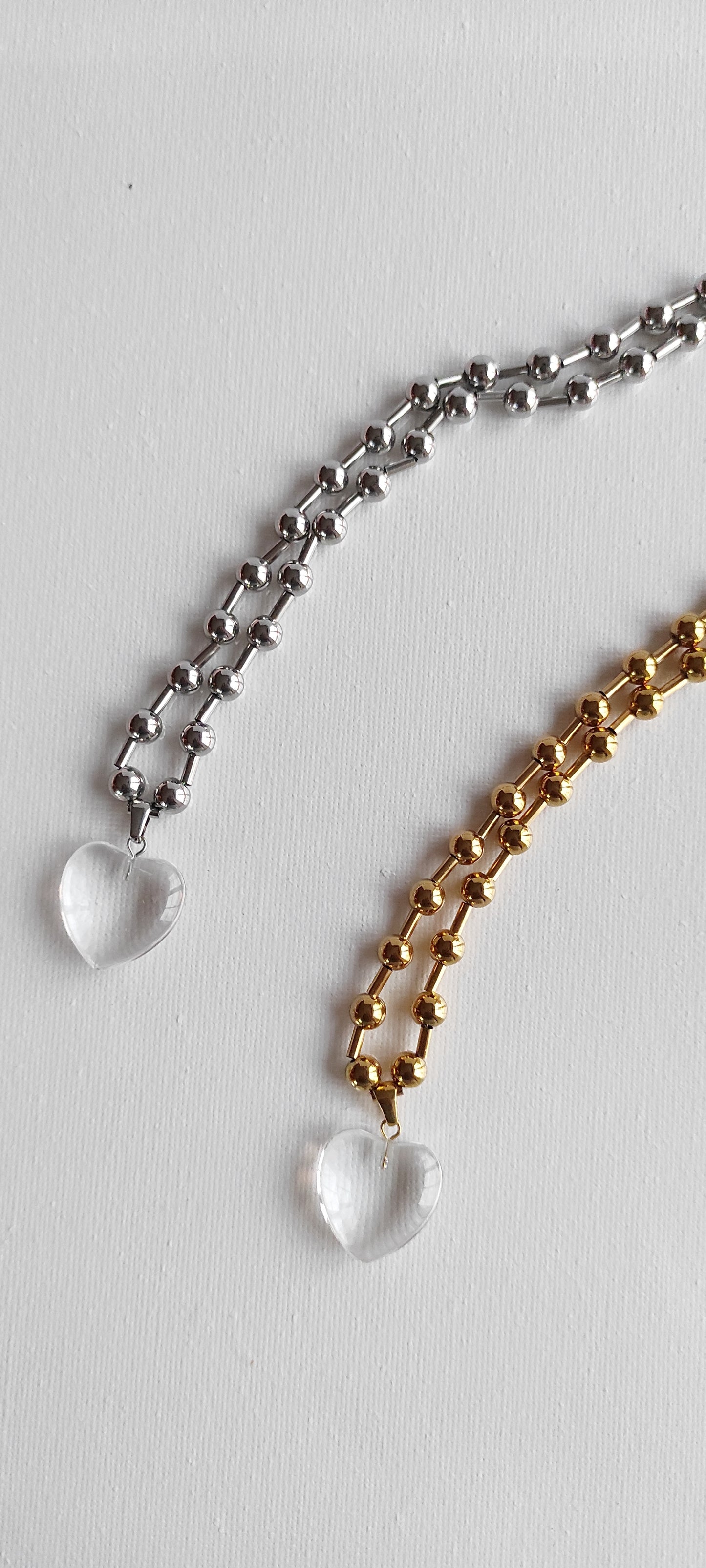 Dulce collar CENTELLA con colgante de corazón transparente